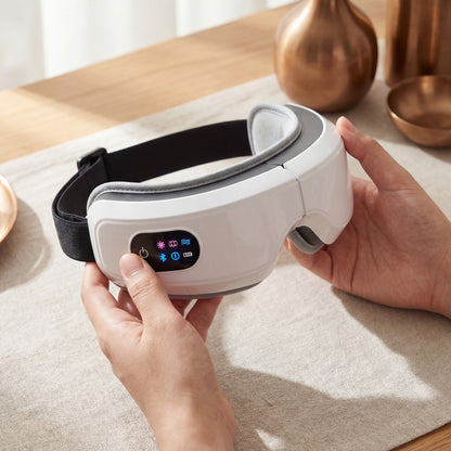 Heated Eye Massager with Air Compression - Bluetooth Music & Temple Massage