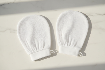 Lifestyle 5 — Two Mitts Flat Lay on Marble